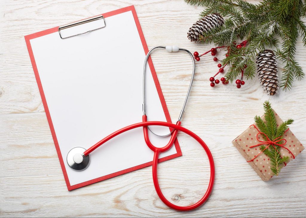 a medical stethoscope with christmas decorations