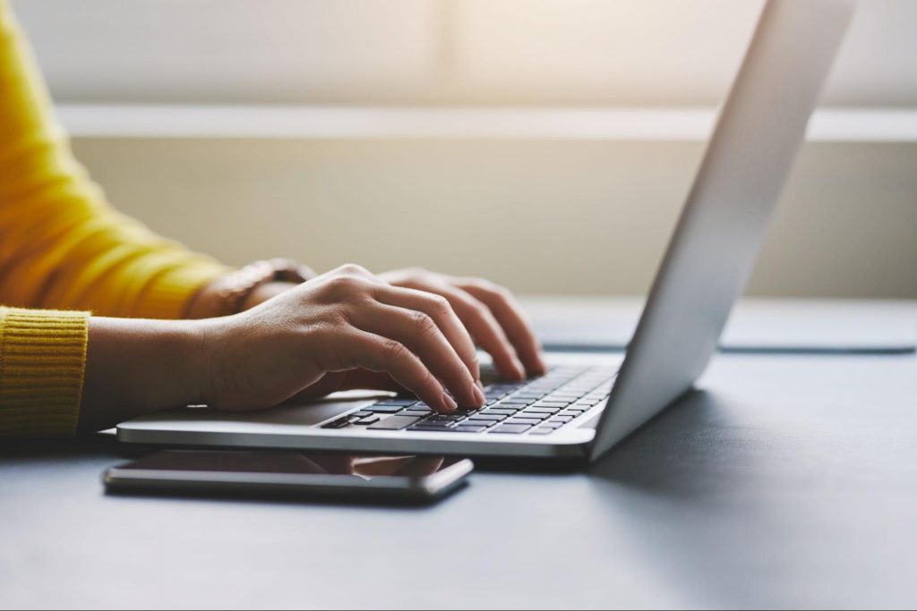 an open laptop to symbolize the Necessary Skills for Medical Transcriptionists