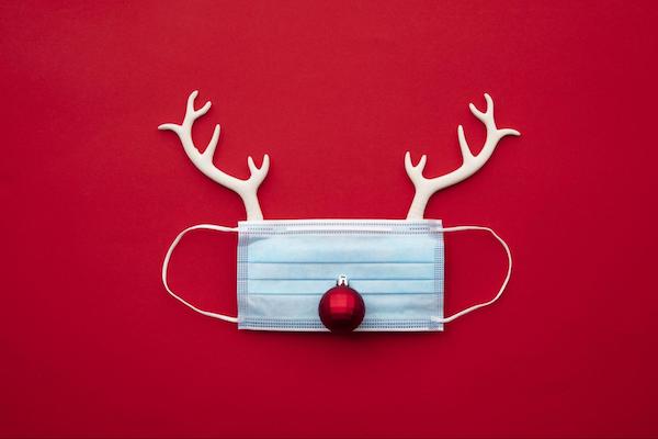 a surgical mask made to look like rudolph the reindeer to represent Reward Your Healthcare Staff Over the Holidays